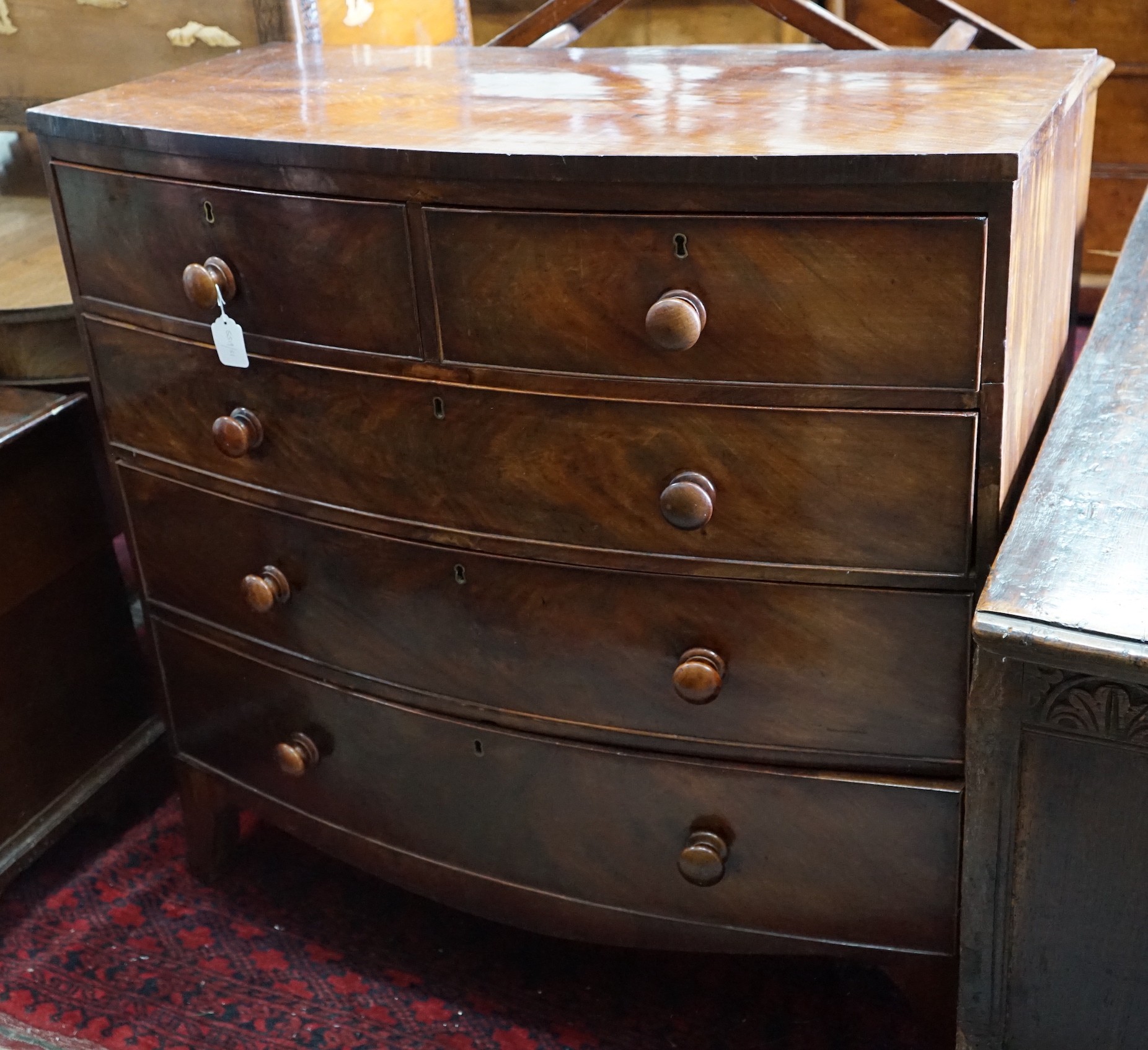 A Regency mahogany bow-fronted chest of drawers, width 104cm, depth 52cm, height 103cm